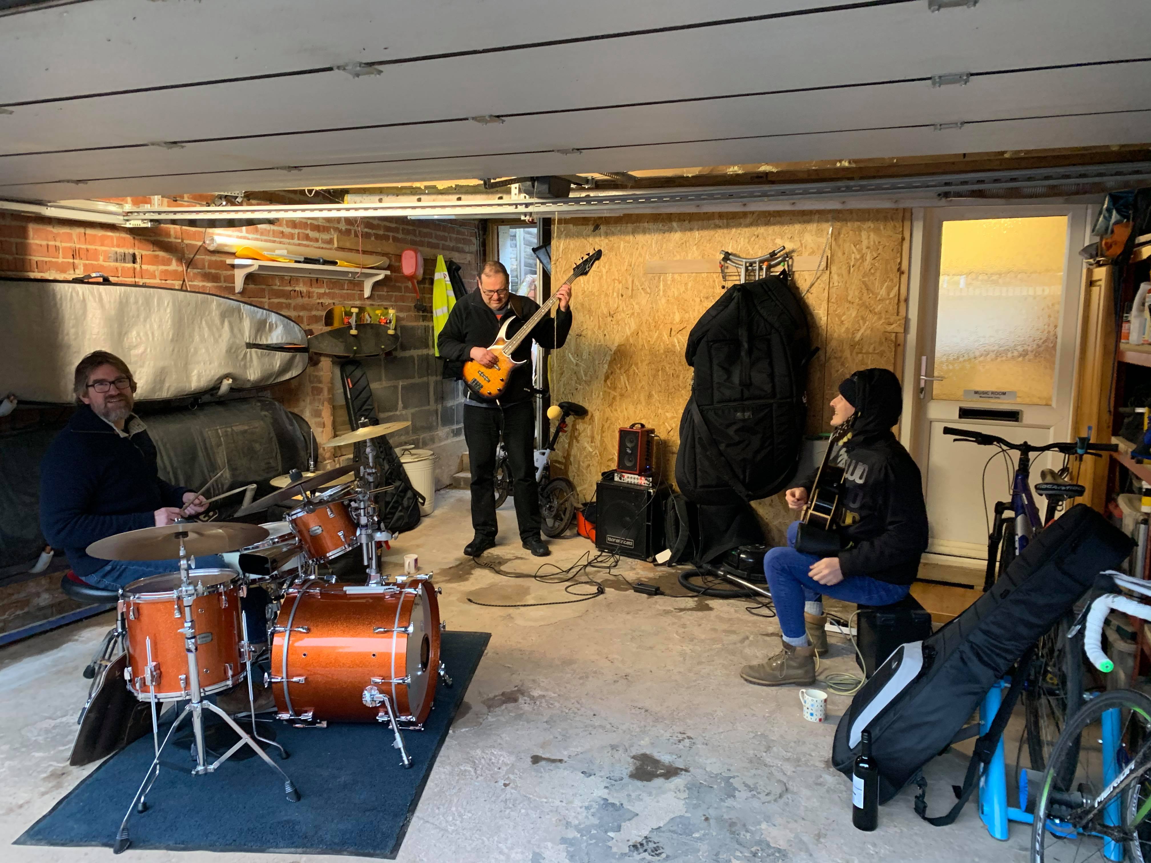Drum, bass, guitar jamming